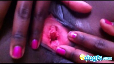 sexy ebony in red bikini demonstrating her pink snatch holes