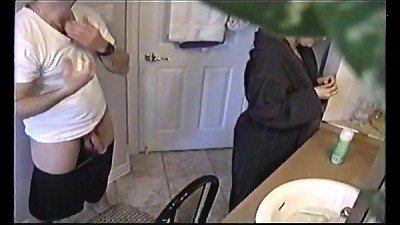 Colette pokes her man while shaving his beard