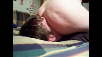 domme facesitting her hubby on the couch