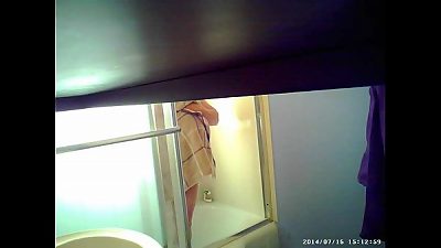 son sets up hidden cam in shower to watch mom's massive mammories