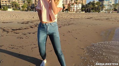 moist shoot on a public beach with naughty Model. Risky outdoor masturbation. foot fetish. pee in jeans.