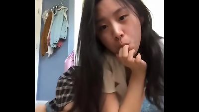 insatiable asian teen Wearing skirt jerks