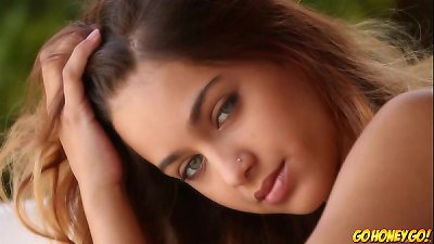 cutie Uma Jolie fingers her humid cooter