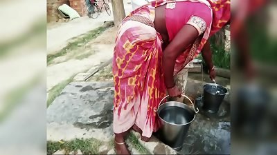 Laying the village woman on the water pump, she deep-throated her nips and then left the genitals of her hard-on on her mouth.