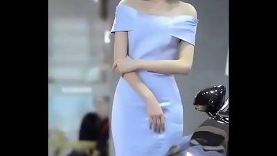 sexy Model Desperate to pee but forced to smirk